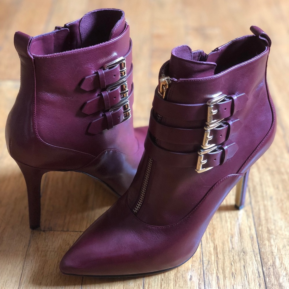 Michael Kors wine leather booties w gold buckles